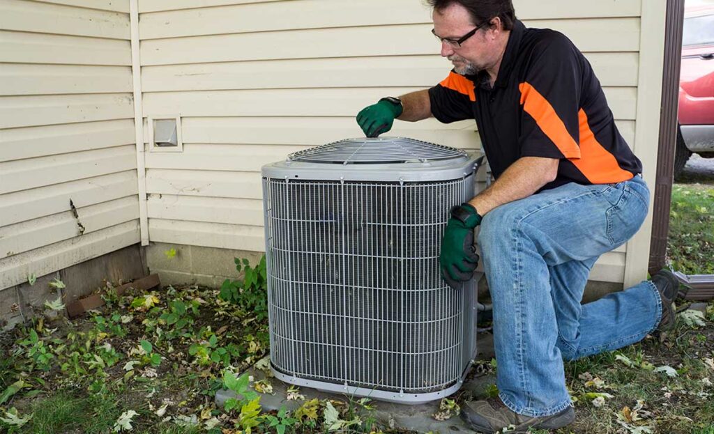 ac repairman finishing repairs