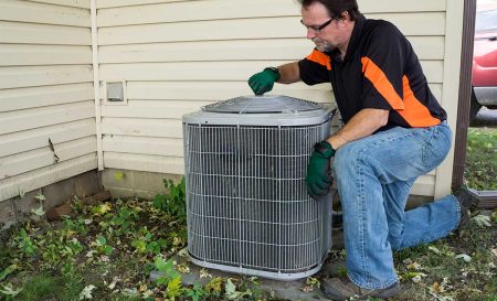 ac repairman finishing repairs